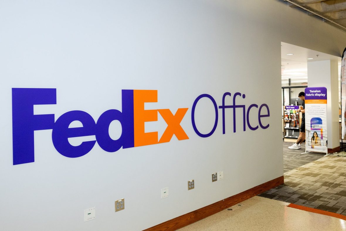 wall outside store with FedEx Office logo in large print.