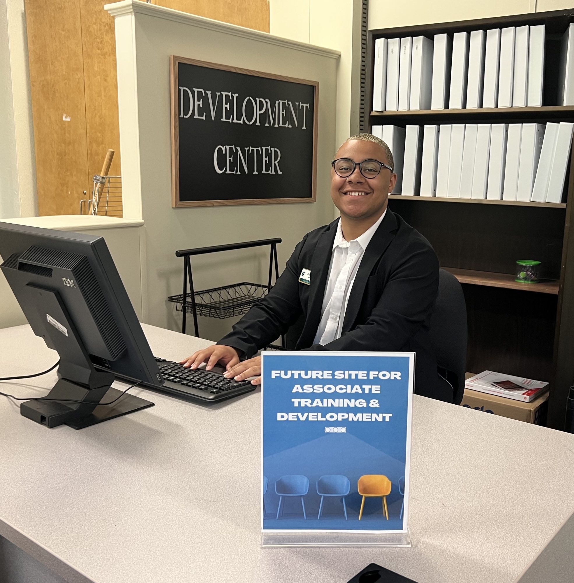 Photo of Elijah Jeffries at the Development Center desk