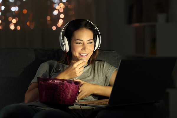 Student eating in front of computer