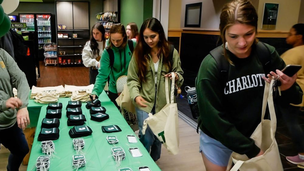 Students help themselves to giveaway items