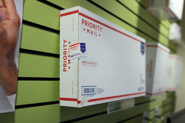 A U.S. Postal Service Priority Mail box.