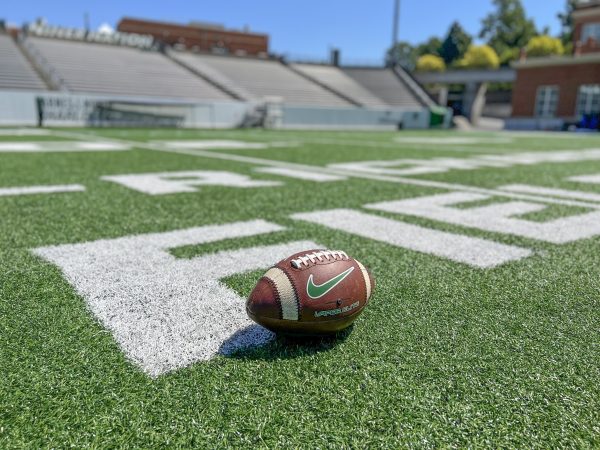 Football sits in the middle of the field in Jerry Richardson Football Stadium